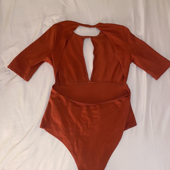 Urban outfitters burnt Orange bodysuit with open back - Picture 2 of 2
